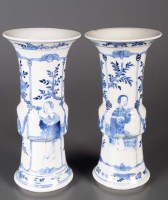 Lot 459 - A pair of blue and white vases of 'Gu' form,...