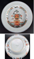 Lot 465 - A Kangxi period Famille Vert plate, decorated...