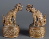 Lot 475 - A pair bronze lion boxes, the oval box with...