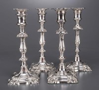 Lot 503 - A matched set of four candlesticks in the mid...