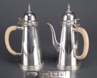 Lot 519 - An Elizabeth II coffee pot and matching hot...