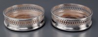 Lot 522 - A pair of Elizabeth II coasters, by C.J....