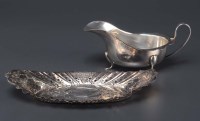 Lot 528 - A George VI sauce boat, by Barker Bros. Silver...
