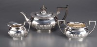 Lot 555 - A George V three-piece bachelor's tea service,...