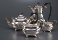 Lot 565 - A George V matched four-piece tea service, by...