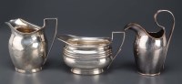 Lot 594 - A George III cream jug, maker's marks...