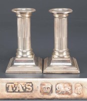 Lot 622 - A pair of Edwardian dwarf candlesticks, by...
