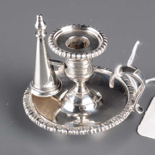 Lot 626 - A Victorian miniature taper chamber stick, by...