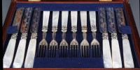 Lot 627 - Eighteen Victorian dessert knives and matching...