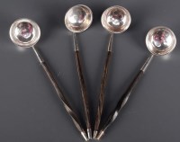 Lot 633 - Four George III Scottish toddy ladles, by...