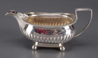 Lot 635 - A George III sauce boat, date and maker's...