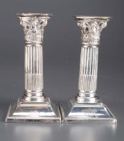 Lot 645 - A pair of Victorian candlesticks, by Rupert...