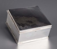 Lot 694 - A George V silver cigarette box, by Omar...