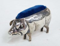 Lot 710 - An Edward VII pig pattern pin cushion, by Adie...