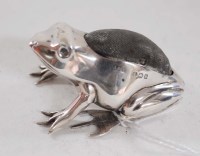 Lot 714 - An Edward VII frog pattern pin cushion, by...