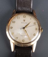 Lot 740 - Rolex: a gentleman's 9ct. gold cased...