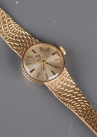 Lot 758 - Omega: a lady's 9ct. gold cased wristwatch,...