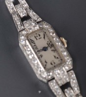 Lot 759 - A lady's diamond cocktail watch, with canted...