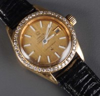 Lot 762 - Omega: a lady's wristwatch, with baton dial...