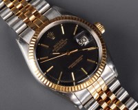 Lot 769 - Rolex: a gentleman's stainless steel and gilt...