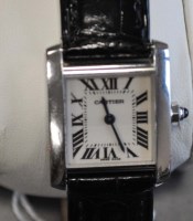 Lot 778 - Cartier 'Tank': a lady's 18ct. white gold...