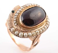 Lot 786 - A garnet, half pearl, gold and emerald ring, c....