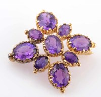 Lot 797 - A Victorian amethyst and gold brooch, the...