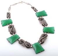 Lot 815 - A chrysoprase and silver necklace, the five...