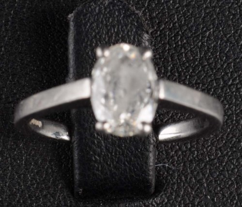Lot 820 - A single stone diamond ring, the oval...