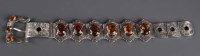 Lot 825 - A late Victorian citrine and silver bracelet,...