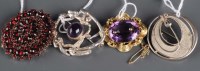 Lot 828 - A Victorian garnet and gilt metal brooch,...