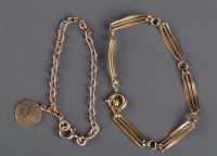 Lot 829 - A yellow gold bracelet composed of oblong...