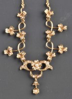 Lot 852 - A Victorian seed pearl and gold necklace,...