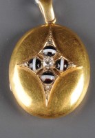 Lot 860 - A Victorian gold, agate and diamond locket,...