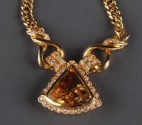 Lot 864 - A citrine, diamond and yellow gold necklace,...