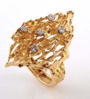 Lot 873 - A yellow gold and diamond ring, c.1970, of...