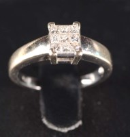 Lot 874 - A nine stone diamond ring, the nine princess...