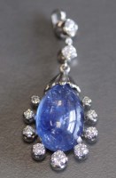 Lot 886 - A sapphire and diamond pendant, the...