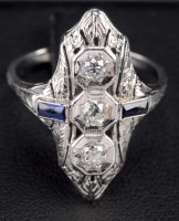 Lot 894 - An Art Deco sapphire and diamond ring, the...