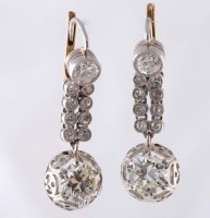 Lot 897 - A pair of diamond earrings, c.1900, of pendant...