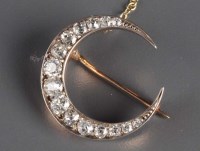 Lot 903 - A diamond crescent brooch, circa 1880, the...