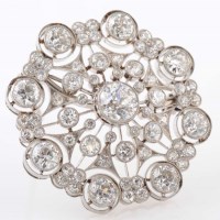 Lot 905 - A Victorian diamond brooch, c.1880, of roundel...