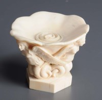 Lot 987 - A carved ivory libation cup, probably French,...