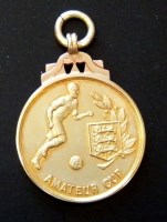 Lot 1005A - A 9ct. gold Football Association Amateur Cup...