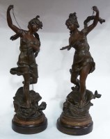 Lot 1009 - A pair of spelter figures after Rousseau,...