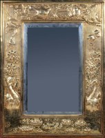 Lot 1045 - An Arts & Crafts wall mirror, the rectangular...