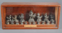 Lot 1057 - A collection of bronze weights, Siam circa...