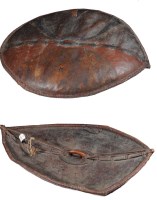 Lot 1066 - A late 19th Century stiff hide Zulu shield,...