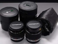 Lot 1114 - An Olympus Zuiko 50mm f3.5 macro lens; and a...