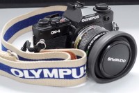 Lot 1116 - An Olympus OM-4 SLR camera (black), fitted...